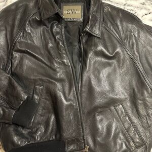Sleek Black Bomber Jacket with Ribbed Cuffs and Zipper
